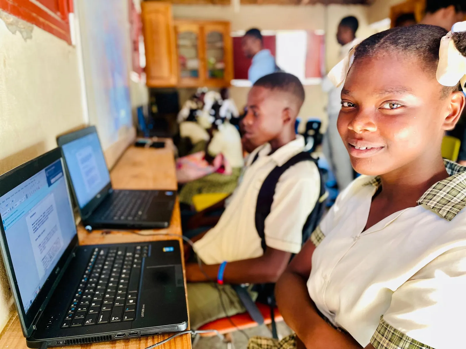 Students in a school computer lab in Haiti